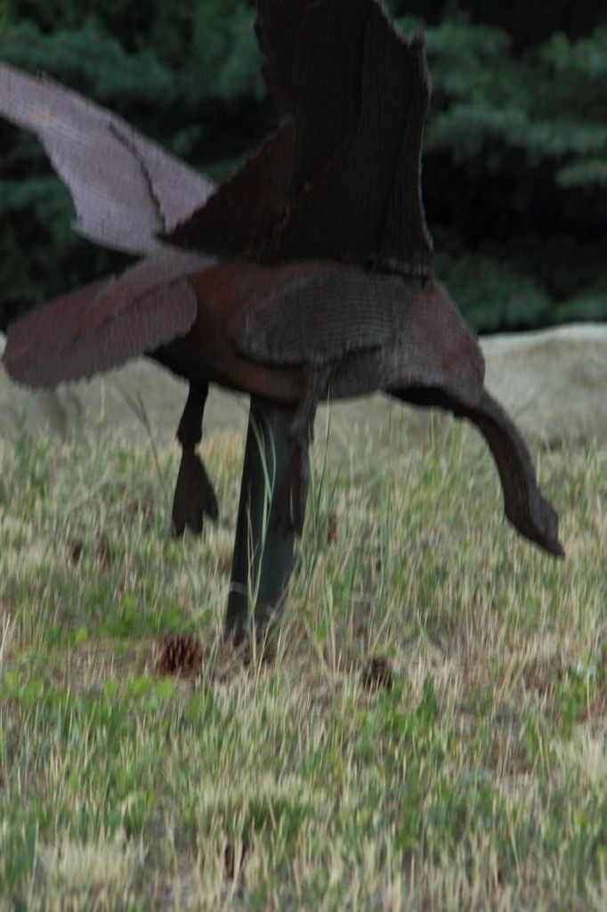 metal sculpture of goose